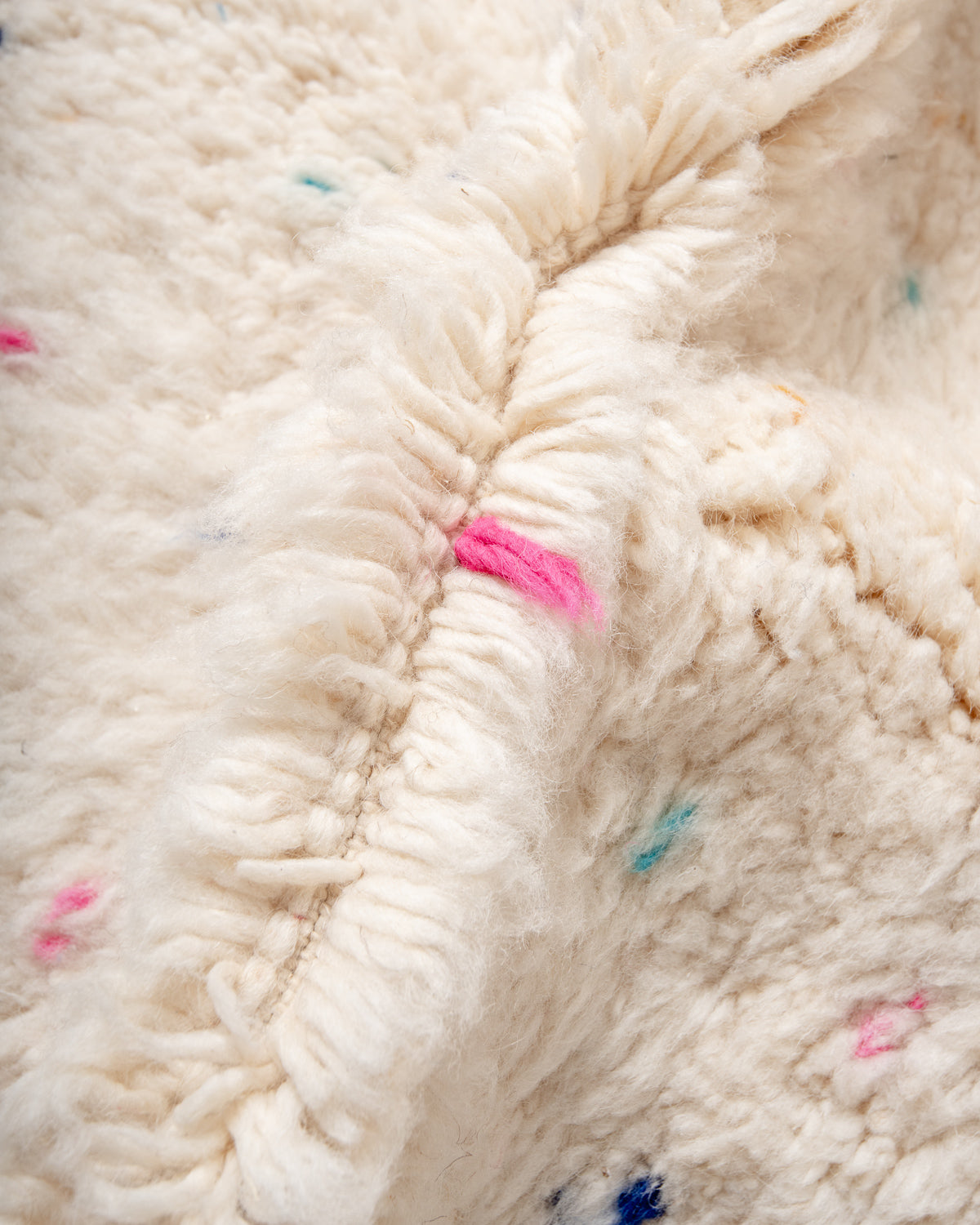 Modern, designer, handcrafted Berber rug from Morocco. Beniourain carpet with beautiful colours and patterns and fluffy wool texture.